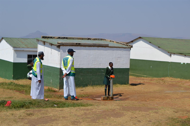 Schoolchildren, like this young learner make use of the water facilities made available by our boreholes on a daily basis